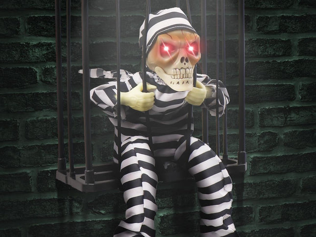 Animated Halloween Skull Prisoner Decoration ‚Äì Infrared Sensor, Screaming Sound & Glowing Red Eye