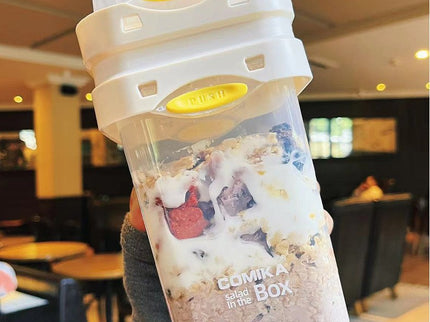 White Portable salad cup with ingredient compartment and fork and spoon - enjoy breakfast on the go